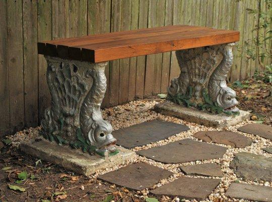 Bench made from scrap wood and reclaimed concrete pedestals. Path is a simple scrap slate & gravel