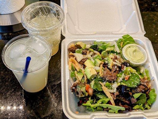 Steak fajita salad and margaritas