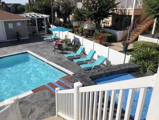 6/15/20. Late Monday afternoon. Pool area in the complex. A code and a bracelet required for each guest to gain entry. View from sun deck.