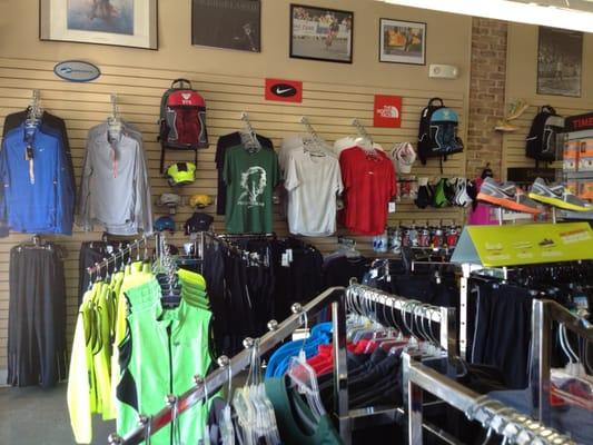 Men's apparel from Nike, Brooks, Asics, Saucony, and New Balance.