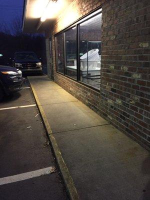 Outside of double bubbles laundry mat! Such a dump!