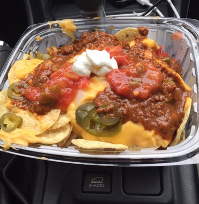 Loaded nachos. Came with sour cream and salsa on the side. Delicious