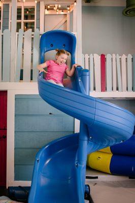 Large gym with indoor slide