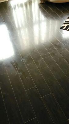 Before photo of customer laminate floor cleaning.