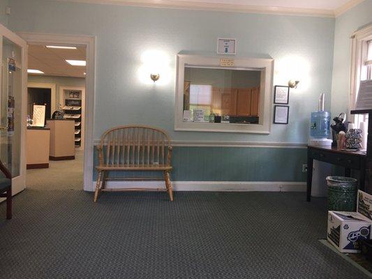 Waiting room and receptionist desk.