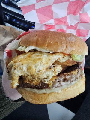 Impossible fat burger with egg and onion ring added.