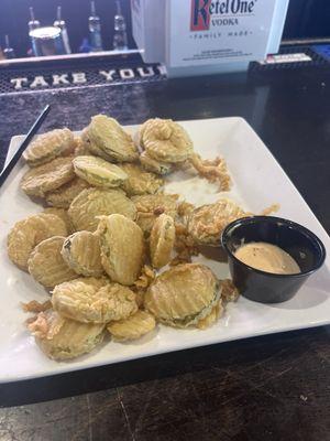 Half eaten fried pickles. Was a pyramid.