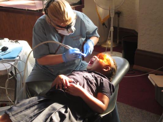 Free dental cleanings, vision screenings, healthcare and counseling services for students and their families.