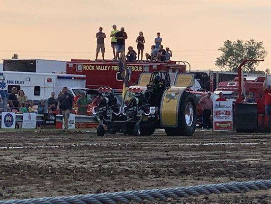 Cotton candy pulling tractor. Mc Adoo Texas cotton farmers. Members of the Outlaw truck and tractor pulling Association. Rock valley Iowa.