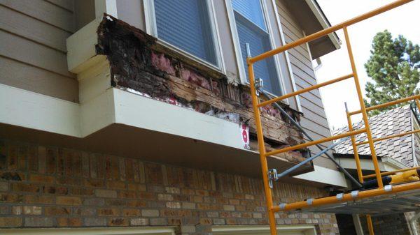 Rotted cantilever section of home above garage.