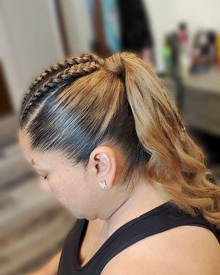 Slicked ponytail with some braids