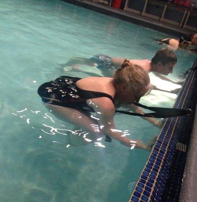 Learn strength building techniques in aqua yoga (Plano)