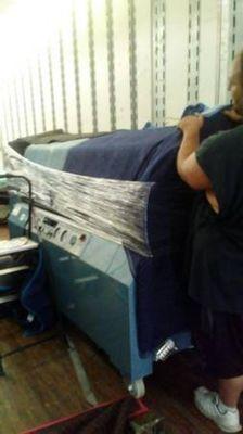 Loading a hyperbaric chamber into a truck, from a closed hospital.