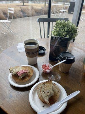 Plain and cinnamon raisin bagel with cappuccino and hot coffee.