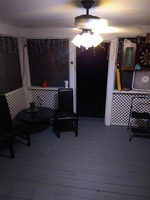 Screened back porch with a grey Deck Over finish