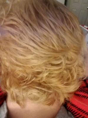 Gorgeous blond with nice wave created.