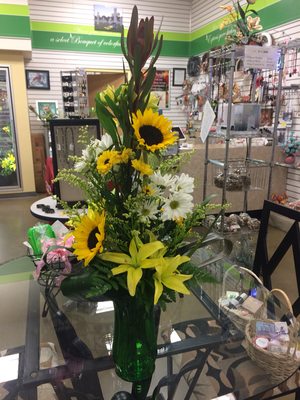 Sunshine arrangement with sunflower & lilies, perfect for "I'm sorry" or "thinking of you"