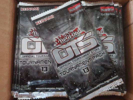 Konami OTS packs for weekly Yu-Gi-Oh tournaments.