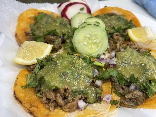 Steak Tacos with everything - Onion, cilantro & green salsa.