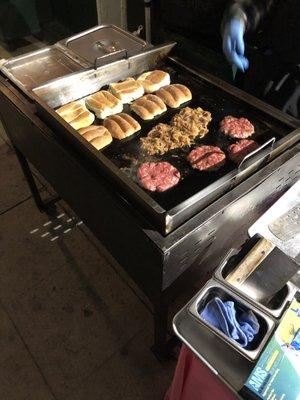 Caramelized onions and buns on the grill