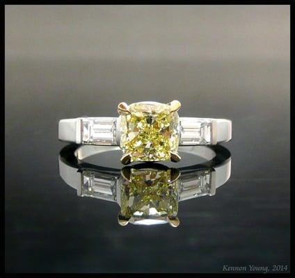 Platinum, fancy yellow diamond, 18K yellow gold ring