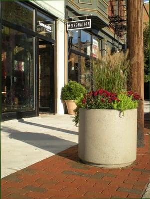 Large Concrete Planters create great protective barriers too.