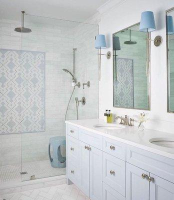 Soft and Fun! This breathtaking marble Primary bathroom was designed by Savarie Interiors