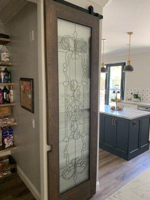 Vintage leaded glass door installed for our pantry door.