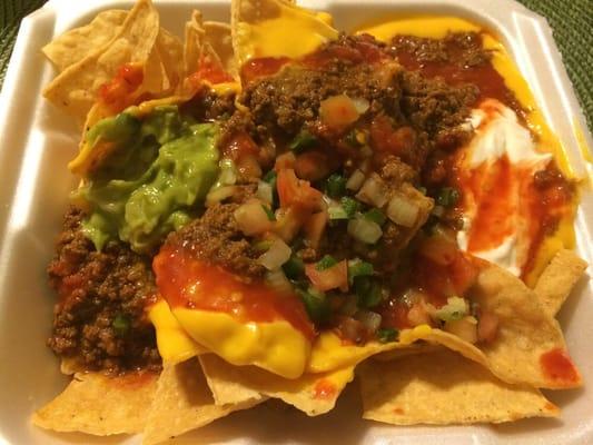 Super nachos with beef.