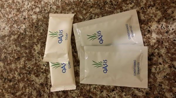 Generic soap sliver w/ shampoo n conditioner tear open packs.