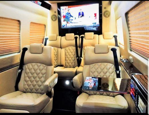 Interiors of a Sprinter with captain seats.