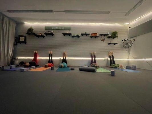 Yoga studio. Legs up the wall pose