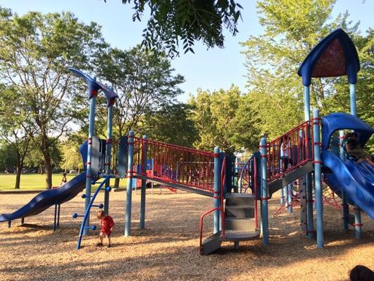 New, clean playground equipment with slides and climbing for all ages of kids