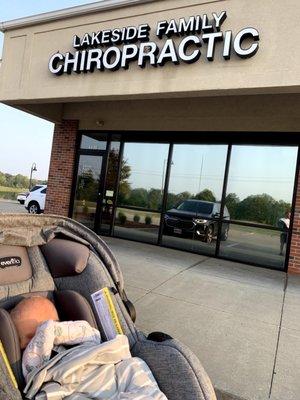 Outside of lakeside family chiropractic with my son's first visit