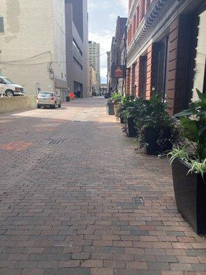 View from 3rd street looking down Lynn. Restaurant sign on the right.