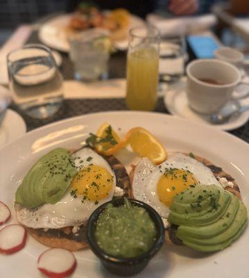 Huevos rancheros with passion fruit mimosa