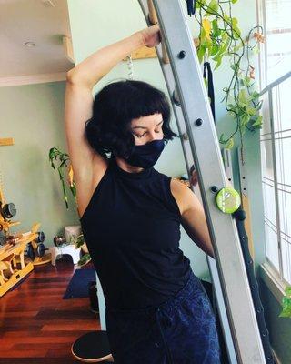 Certified Gyrotonic Pretrainer Heather Jackson working on the Gyrotonic Archway