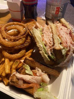 Turkey Club with Spicy Fries and Onion Rings