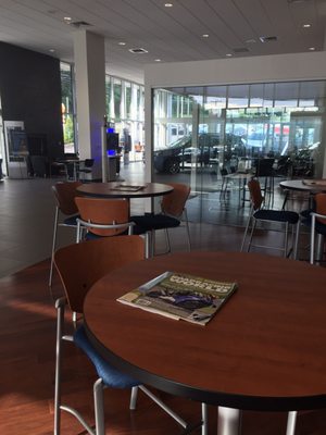 Waiting area with snacks, fruit, cold beverages and Starbuck's coffee.