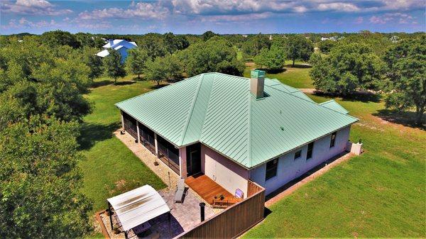 Aged Copper Standing seam metal roof.