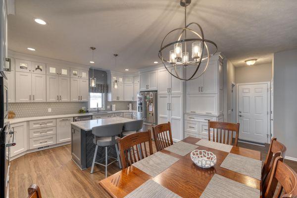 Plato Woodwork cabinets with U Quartz countertops and Lantern Grey backsplash tile.