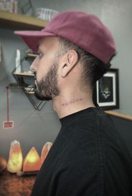 Fine line neck tattoo "it is what it is"