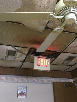 Water stained ceiling, broken ceiling tiles