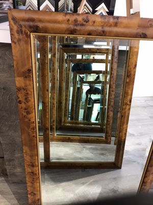 We do custom mirrors. All shapes.  All sizes.  Custom beveled edges.