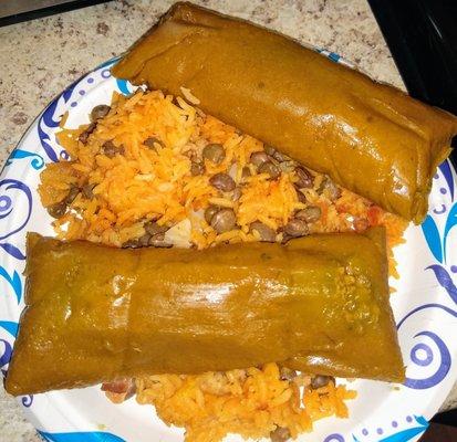 Ground beef and chicken pasteles (with arroz con gandules that I made at home)