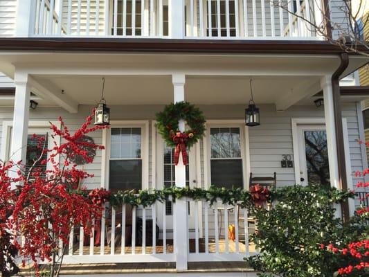 The porches RB painted for us and the wreath they left as a gift!