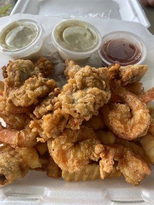 Really good fresh fried seafood   Shrimp Oysters Catfish  Damn good hush puppies!!!