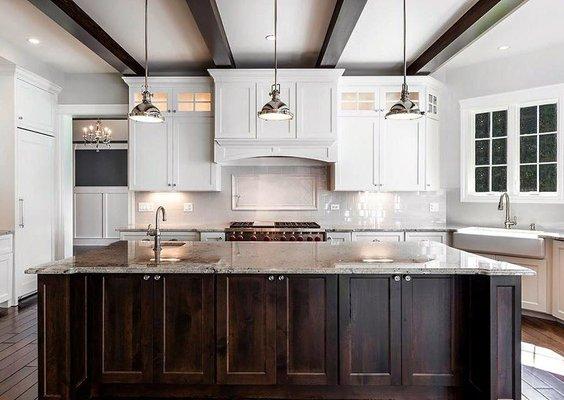 Stunning open kitchen with wood beams and industrial accents!