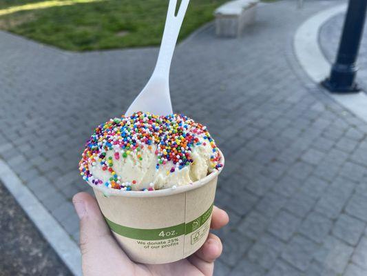 One Scoop vanilla ice cream with sprinkles