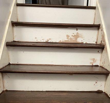 Installer stained the steps leading to the basement- didn't use any painters tape or repainted where he left the stain.